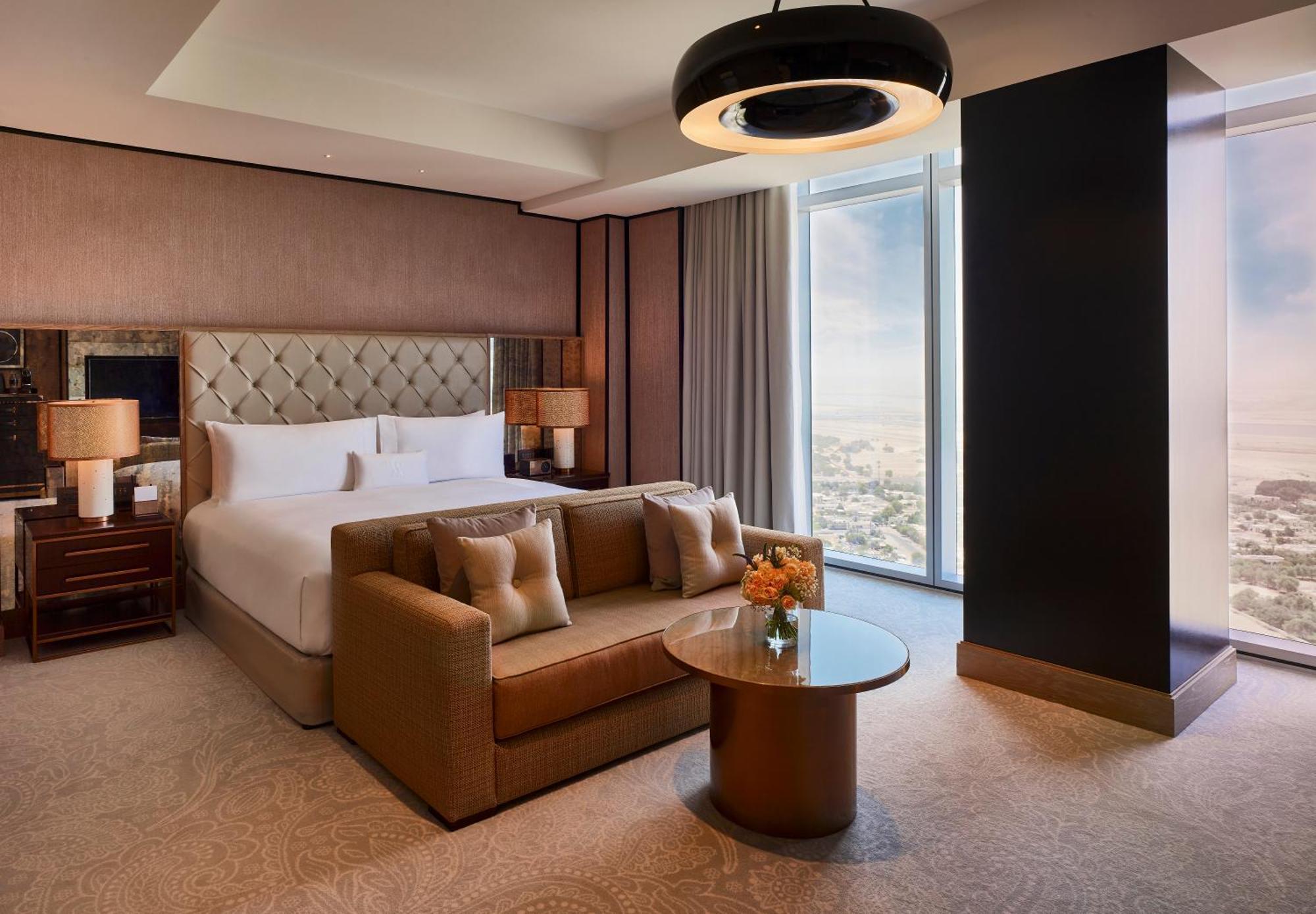 Waldorf Astoria Dubai International Financial Centre Hotell Exteriör bild A bedroom at the Address Downtown Dubai